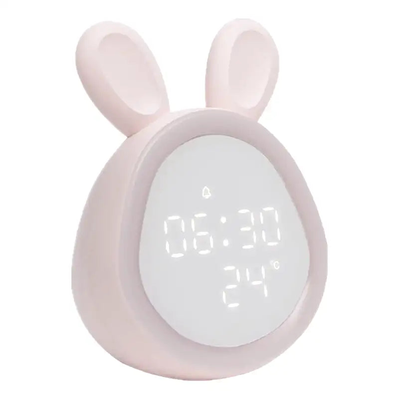 Réveil numérique rose en forme de lapin -  - reveil-enfant-lumiere - ["ado","enfant","fille","lapin","lumineux","num\u00e9rique","petit reveil","rose","r\u00e9veil digital","r\u00e9veil enfant","simple","veilleuse"]