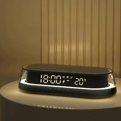 Réveil ovale noir LED avec chargeur induction -  - reveil-chargeur-induction-lumineux - ["digital","lumineux","lumi\u00e8re","num\u00e9rique","plastique","r\u00e9veil digital","simple"]