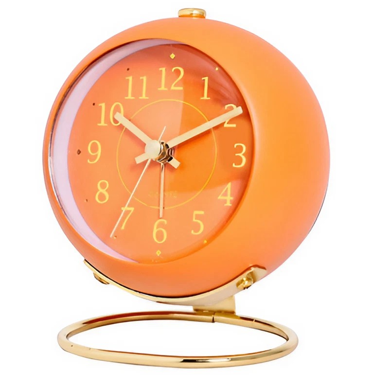 Réveil rond orange brillant avec base dorée -  - reveil-vintage-orange - ["analogique","Jour Nuit","R\u00e9veil Analogique","voyage"]